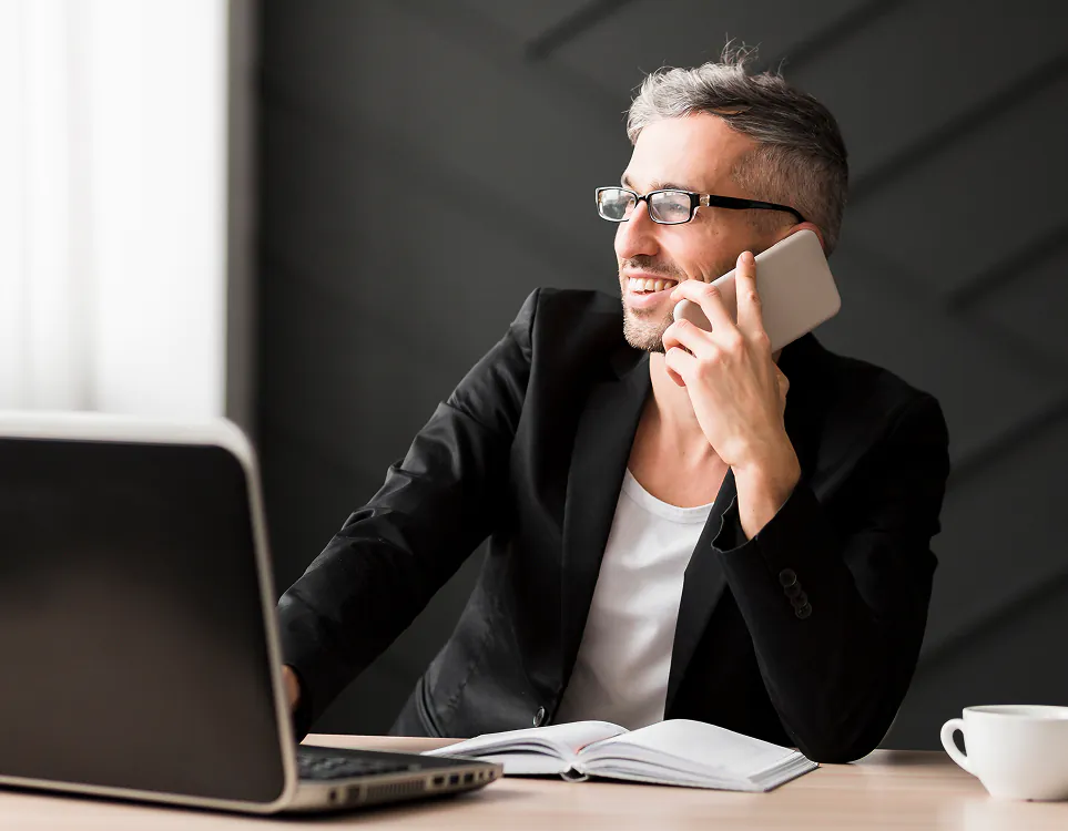 TVHammer support specialist taking a customer call from the Sydney office